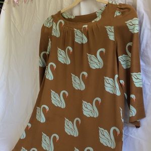 Fossil, 3/4.sleeve, 32” long. No pockets.